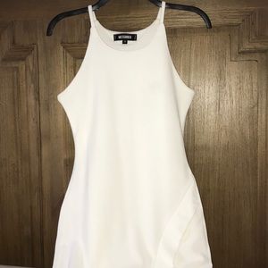 Missguided White dress with asymmetrical hem.